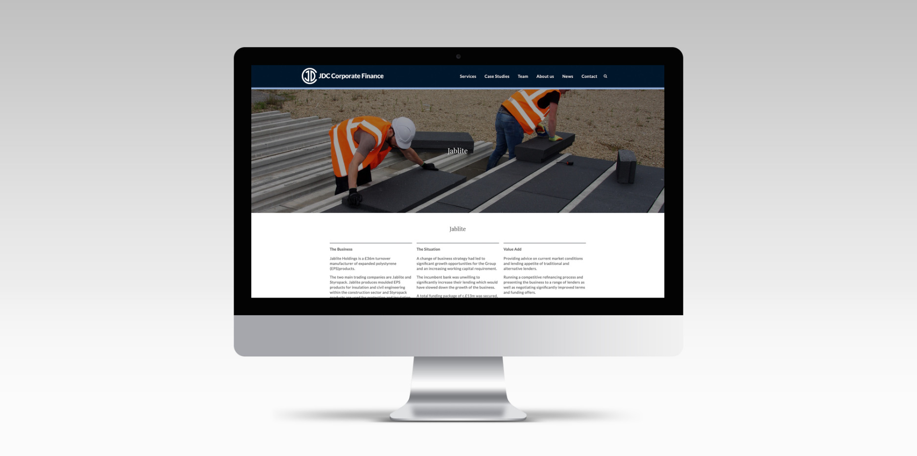 JDC corporate Finance website on iMac